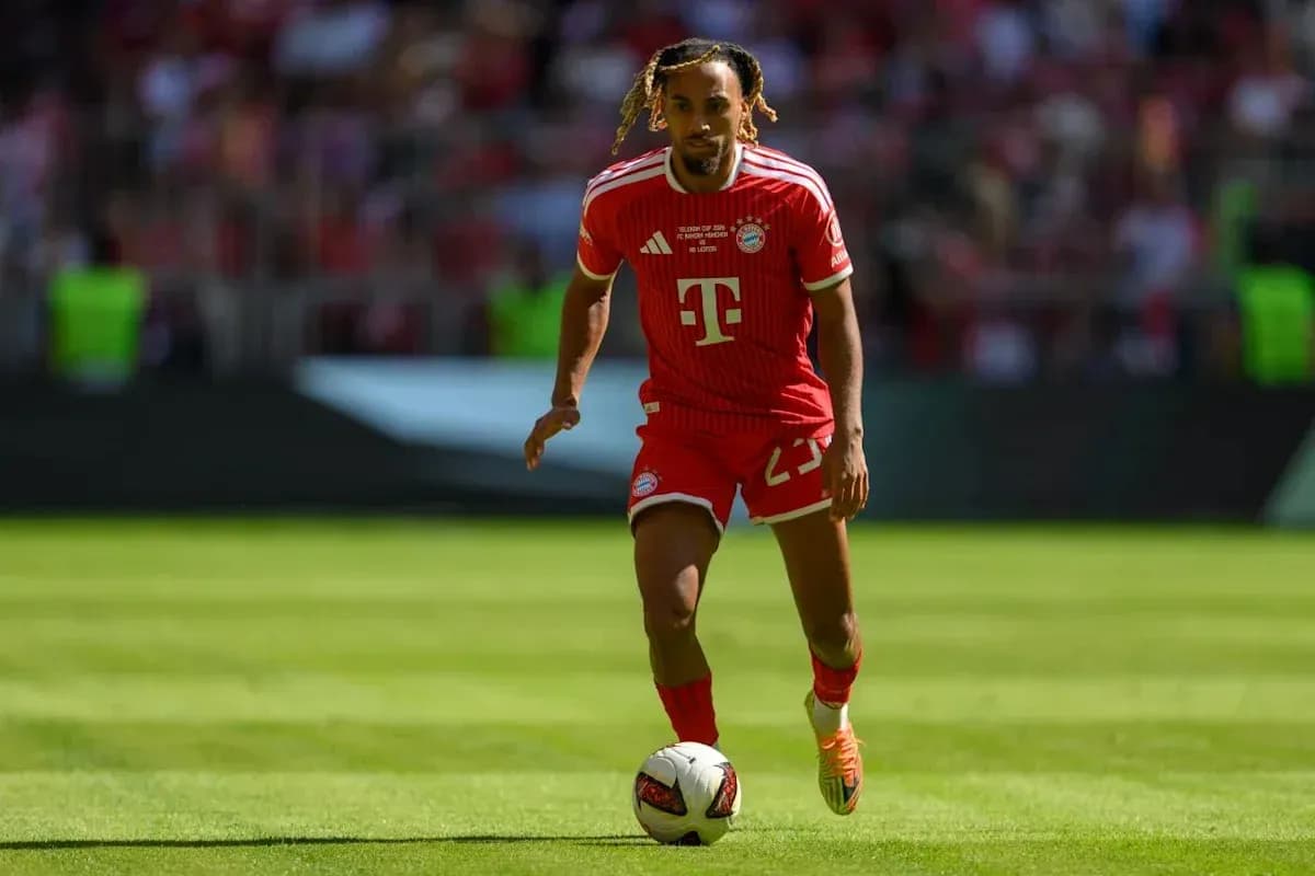 Bayern Munich player dribbling the ball on field Bayern Munich player dribbling the ball on field