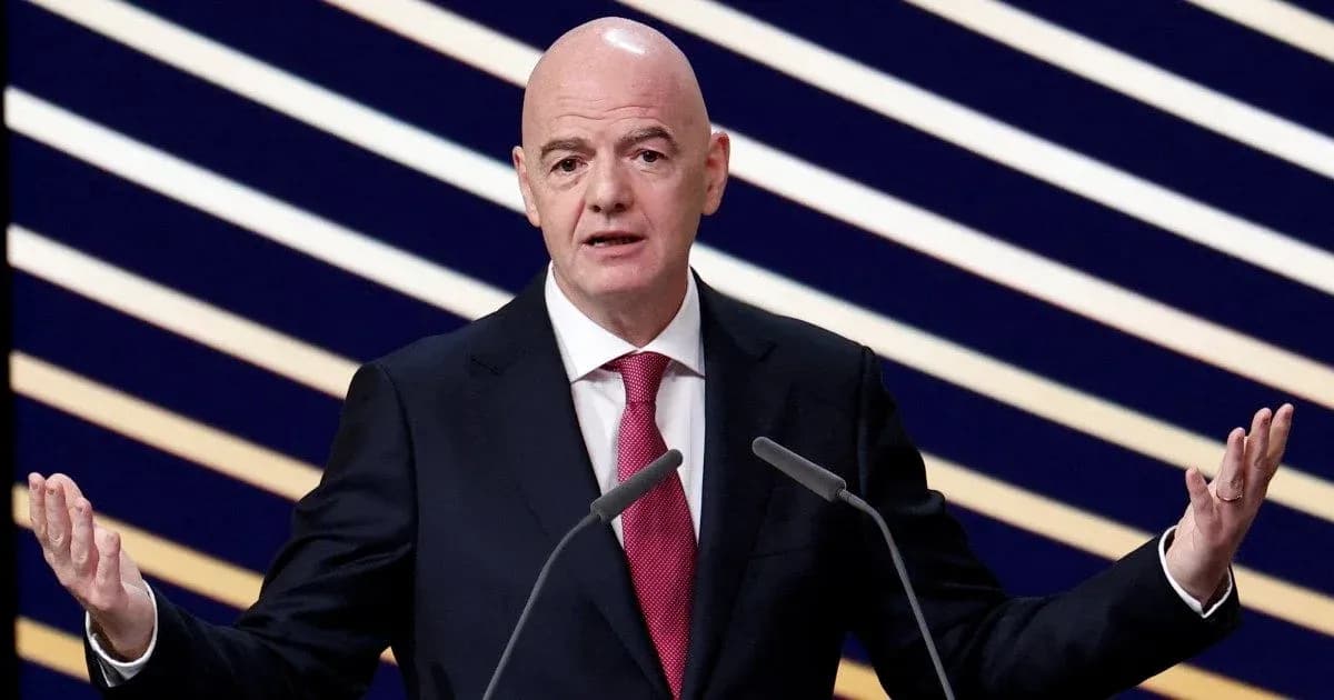 FIFA president speaking at press conference podium FIFA president speaking at press conference podium