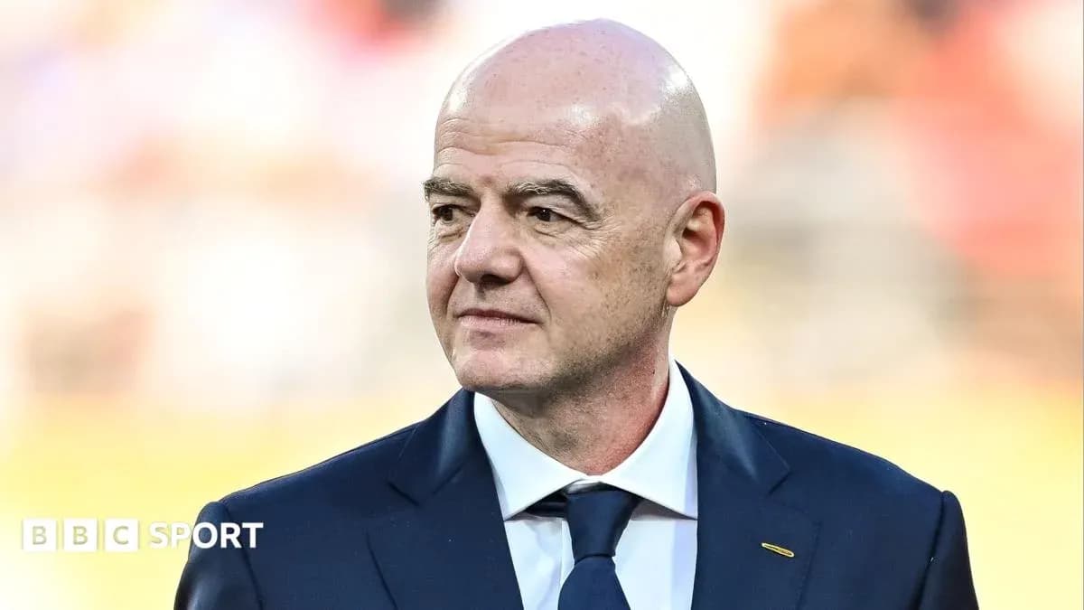 FIFA president standing before a match event FIFA president standing before a match event