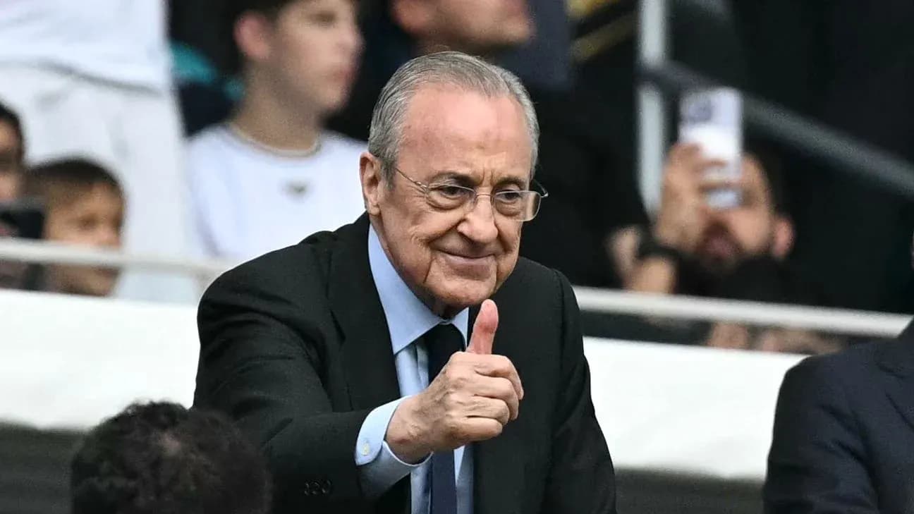 Person giving a thumbs up in stadium Person giving a thumbs up in stadium