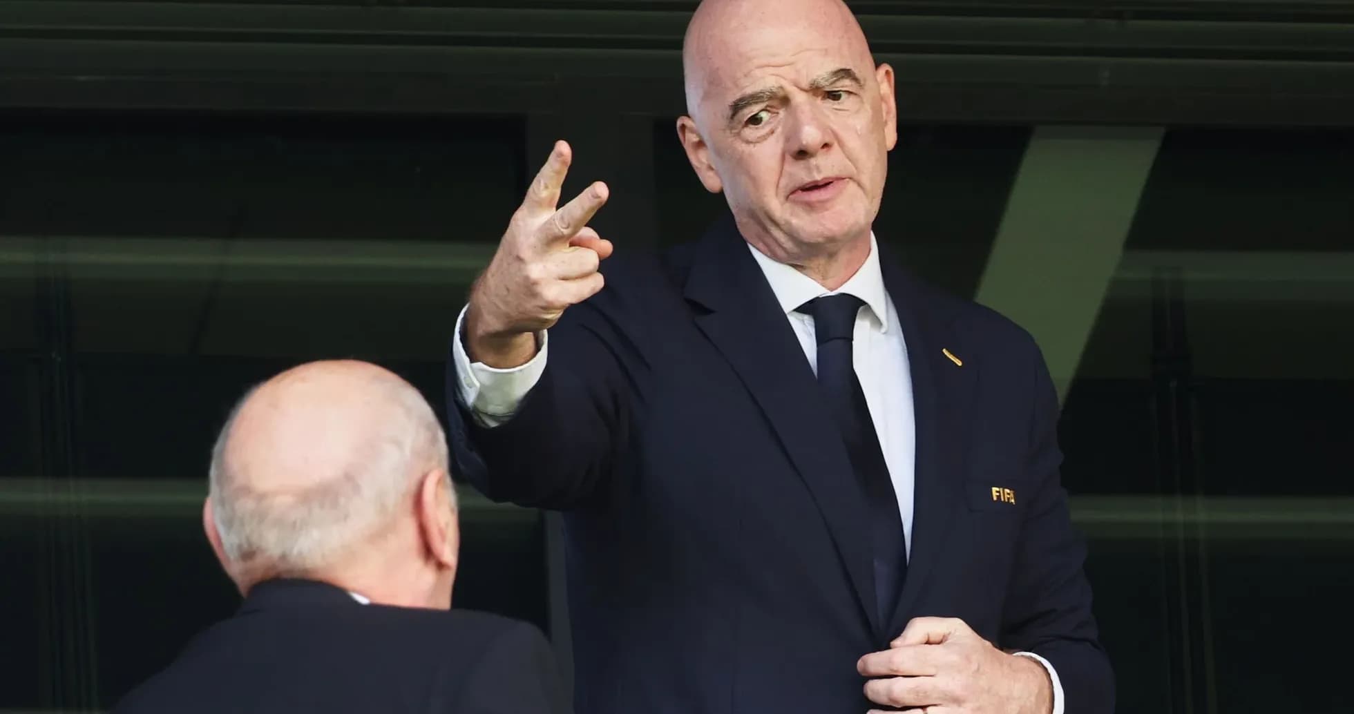 FIFA president speaking during event in stadium FIFA president speaking during event in stadium