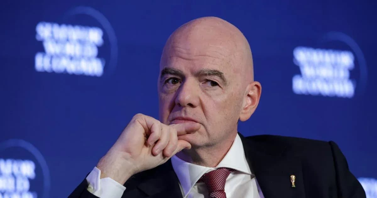 Man with hand on chin at conference Man with hand on chin at conference