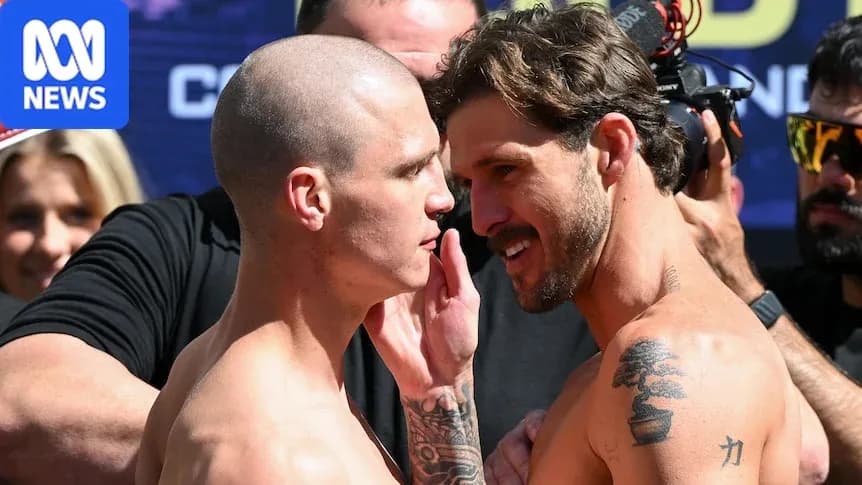 Two fighters facing off at weigh-in event Two fighters facing off at weigh-in event