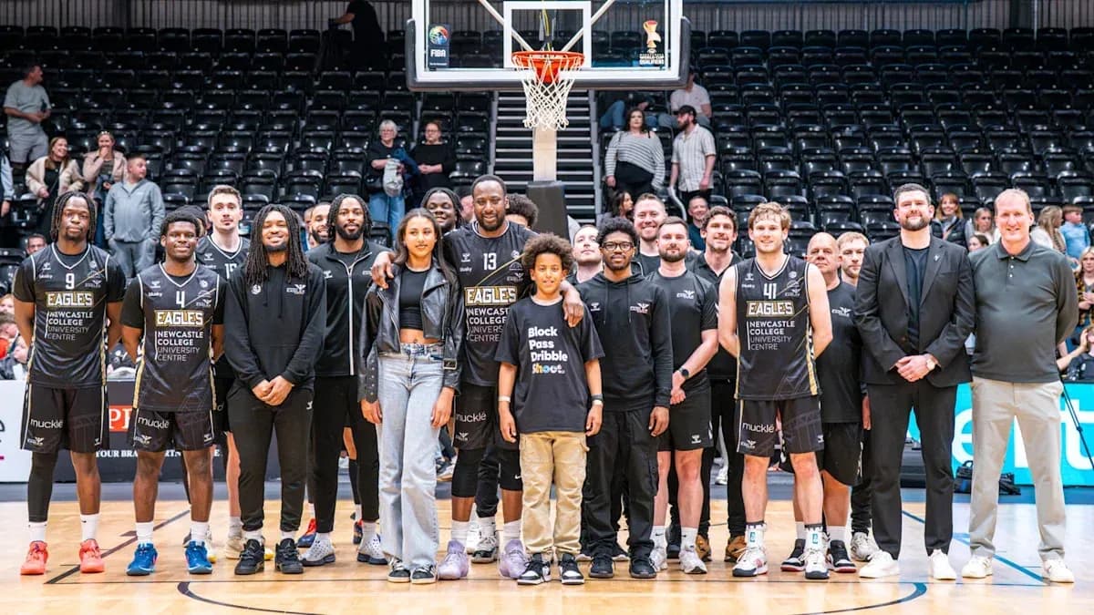 Newcastle Eagles team posing together on court Newcastle Eagles team posing together on court