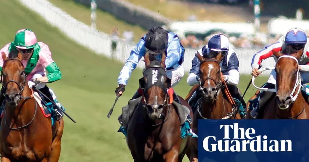 Jockeys racing on horses during horse race Jockeys racing on horses during horse race