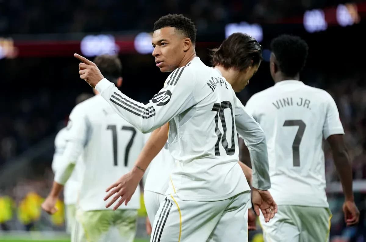 Kylian Mbappé celebrating with teammates after scoring Kylian Mbappé celebrating with teammates after scoring