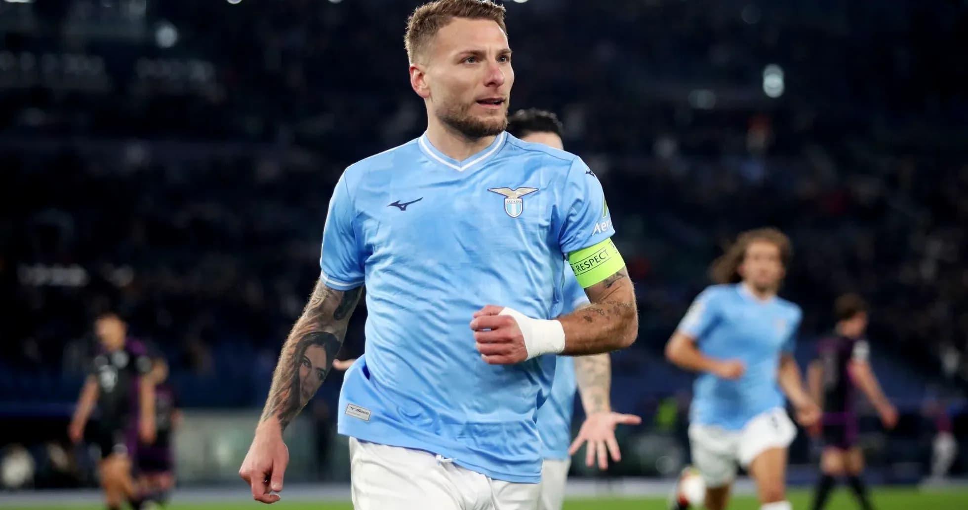 Lazio player celebrating during a match Lazio player celebrating during a match