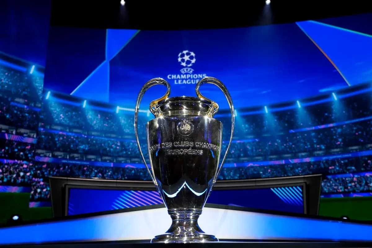 Champions League trophy displayed on stage Champions League trophy displayed on stage