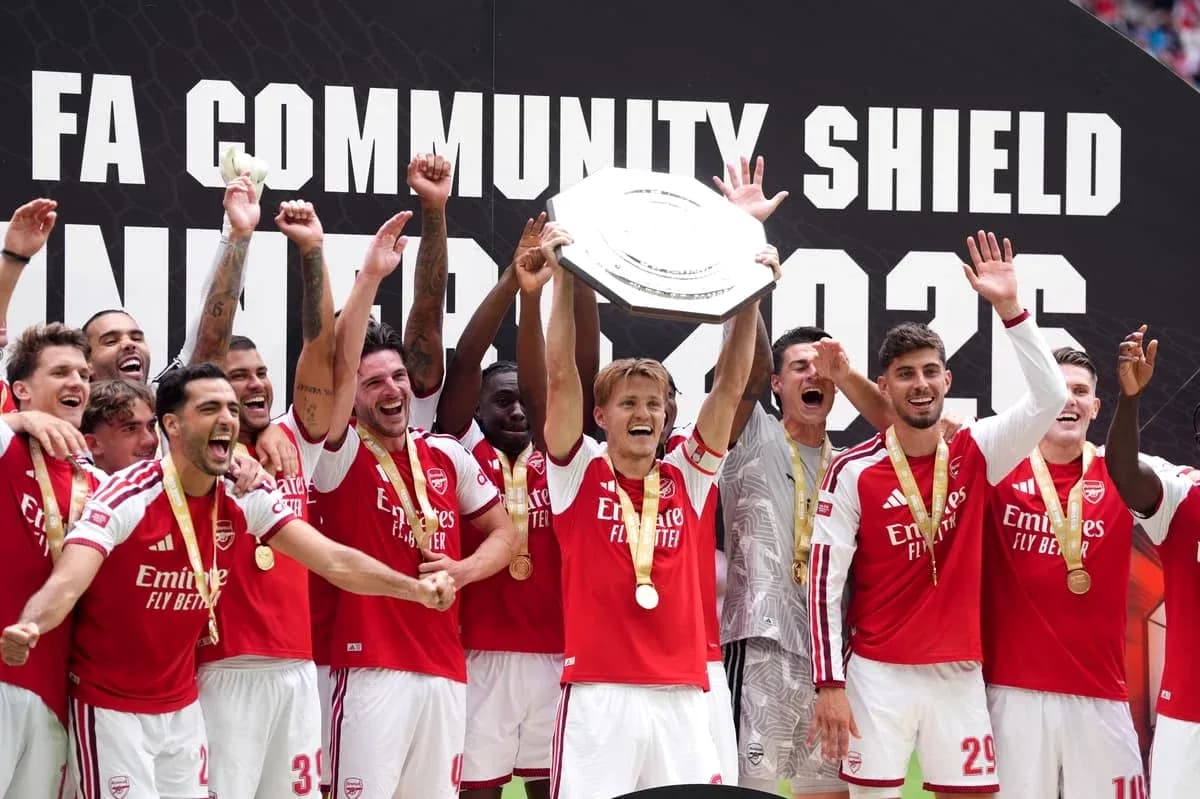 Arsenal players celebrating Community Shield victory Arsenal players celebrating Community Shield victory
