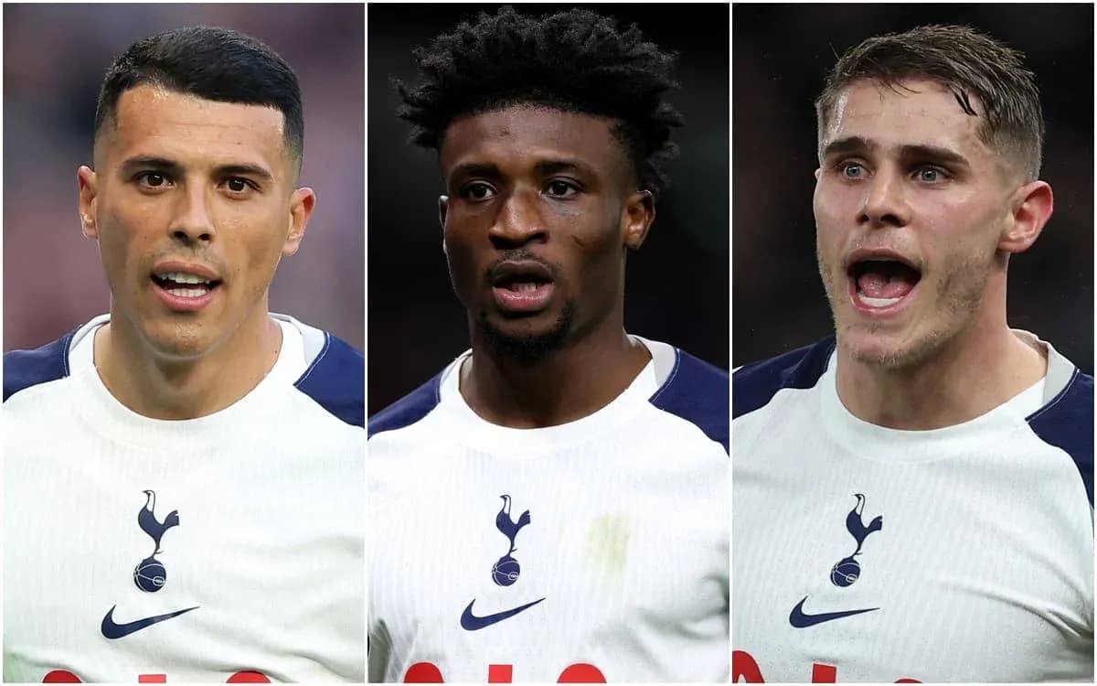 Three Tottenham players in white jerseys during match Three Tottenham players in white jerseys during match