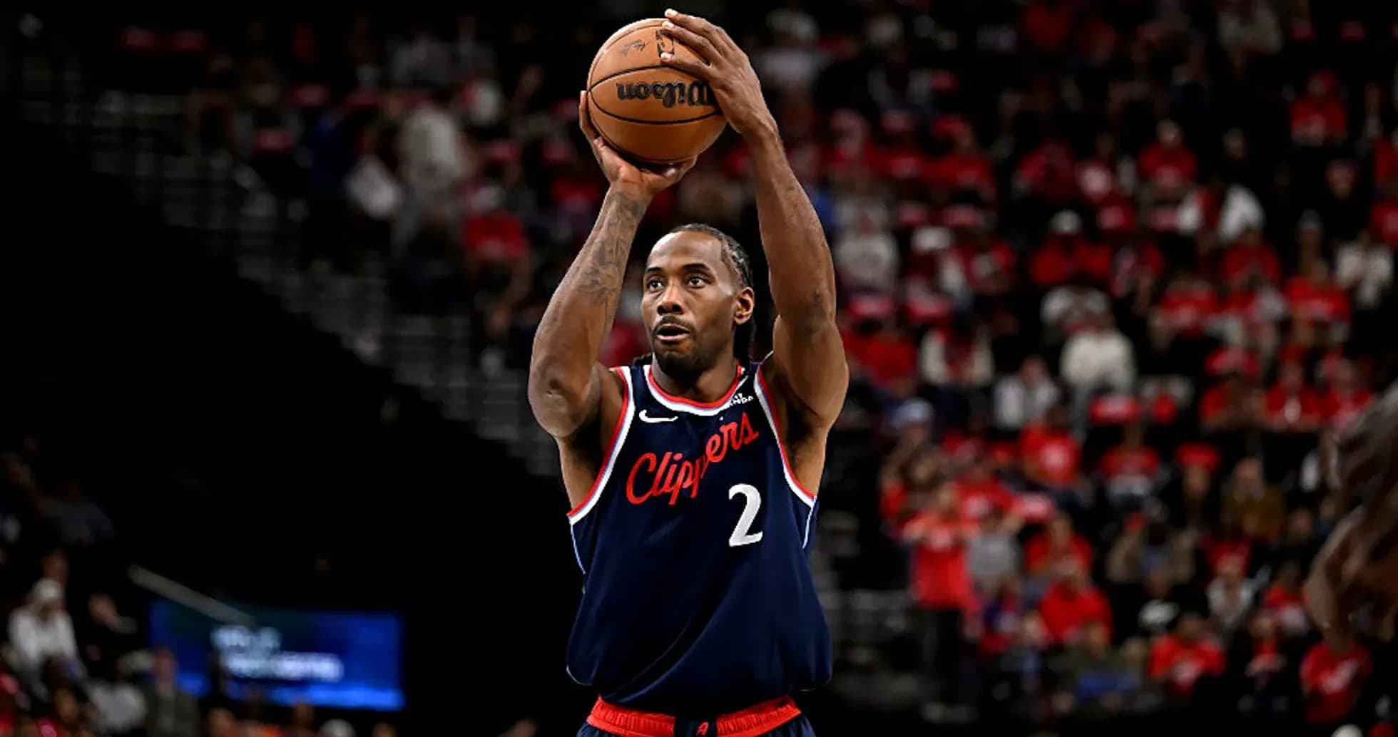 Kawhi Leonard shooting during a basketball game Kawhi Leonard shooting during a basketball game