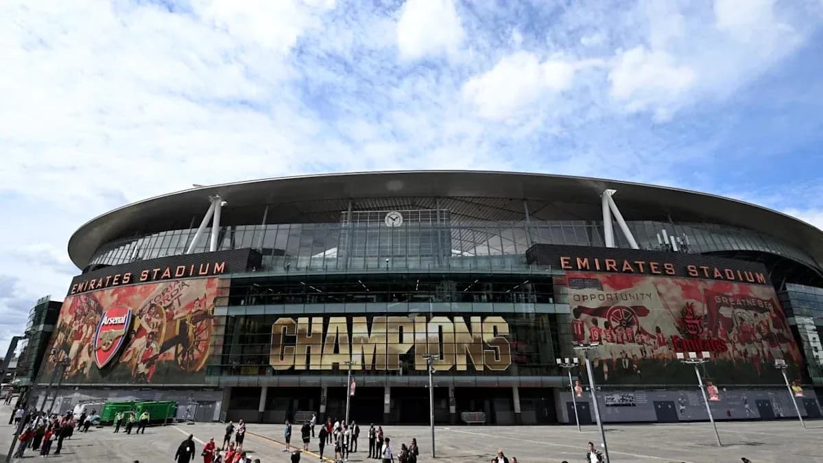Emirates Stadium exterior with Champions banner Emirates Stadium exterior with Champions banner