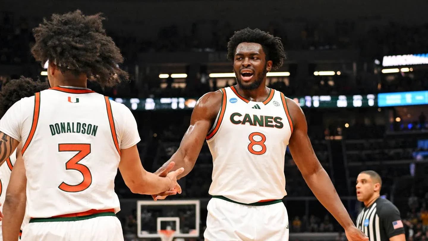 Miami players celebrating during NCAA basketball game Miami players celebrating during NCAA basketball game