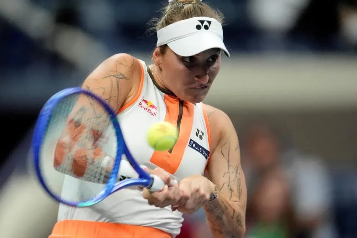 Tennis player hitting a forehand shot in match Tennis player hitting a forehand shot in match