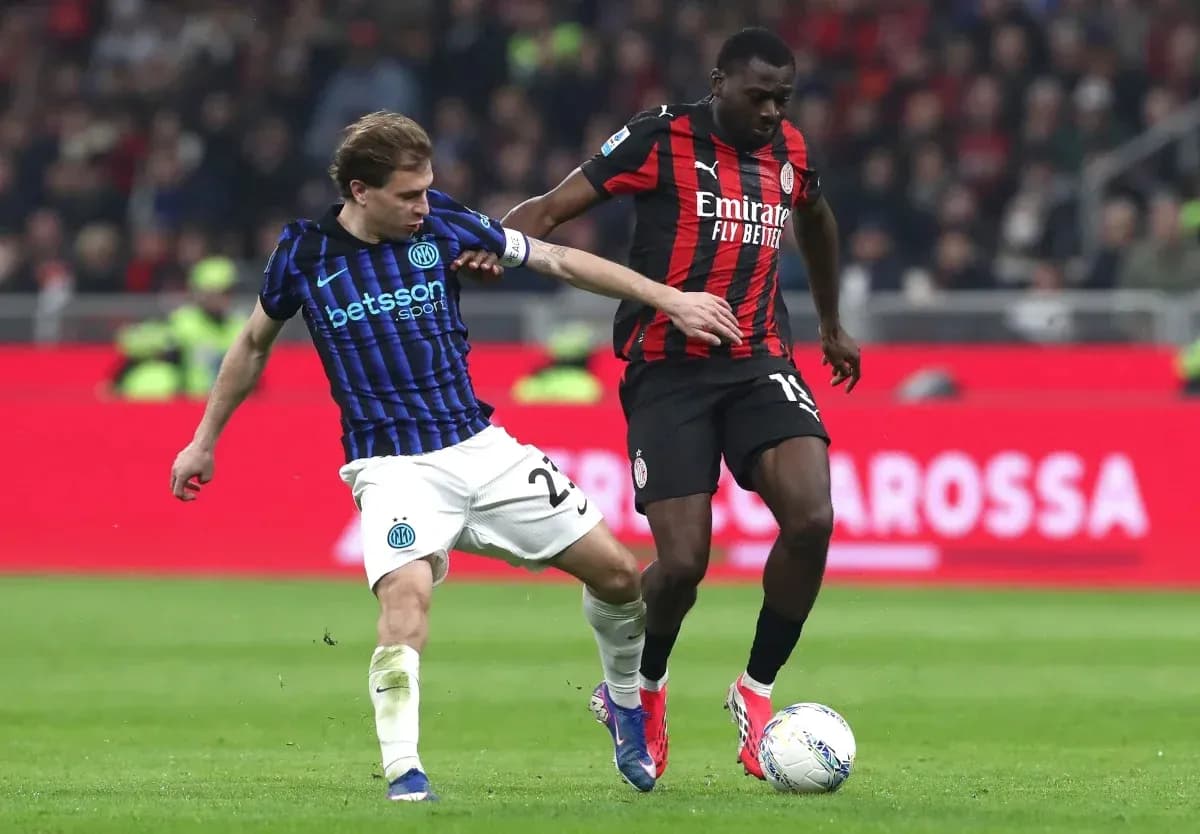 Two players contesting for the ball during match Two players contesting for the ball during match