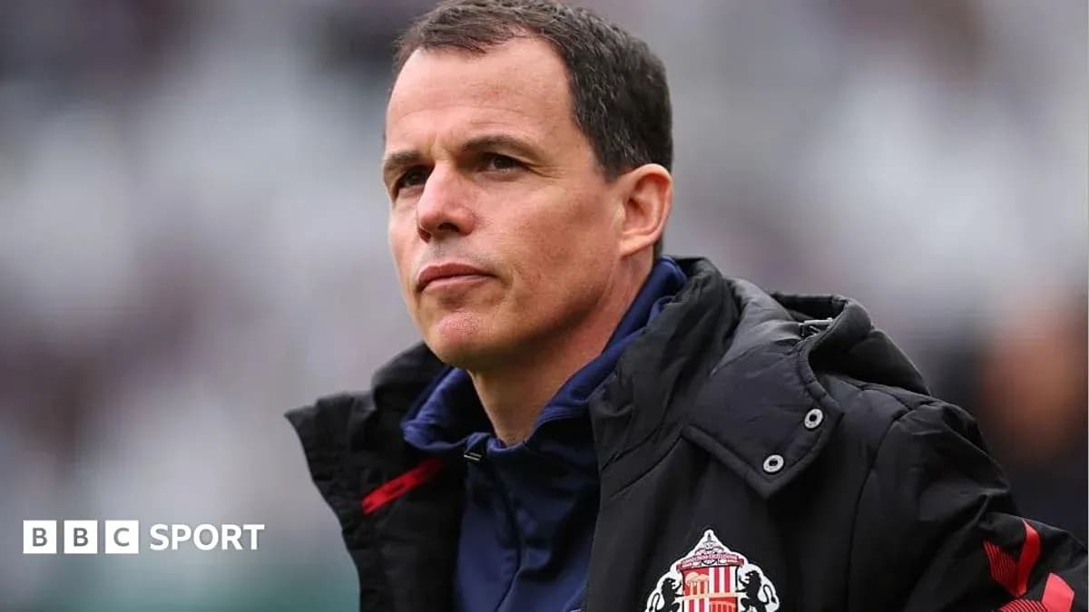 Sunderland manager observing the match from sidelines Sunderland manager observing the match from sidelines