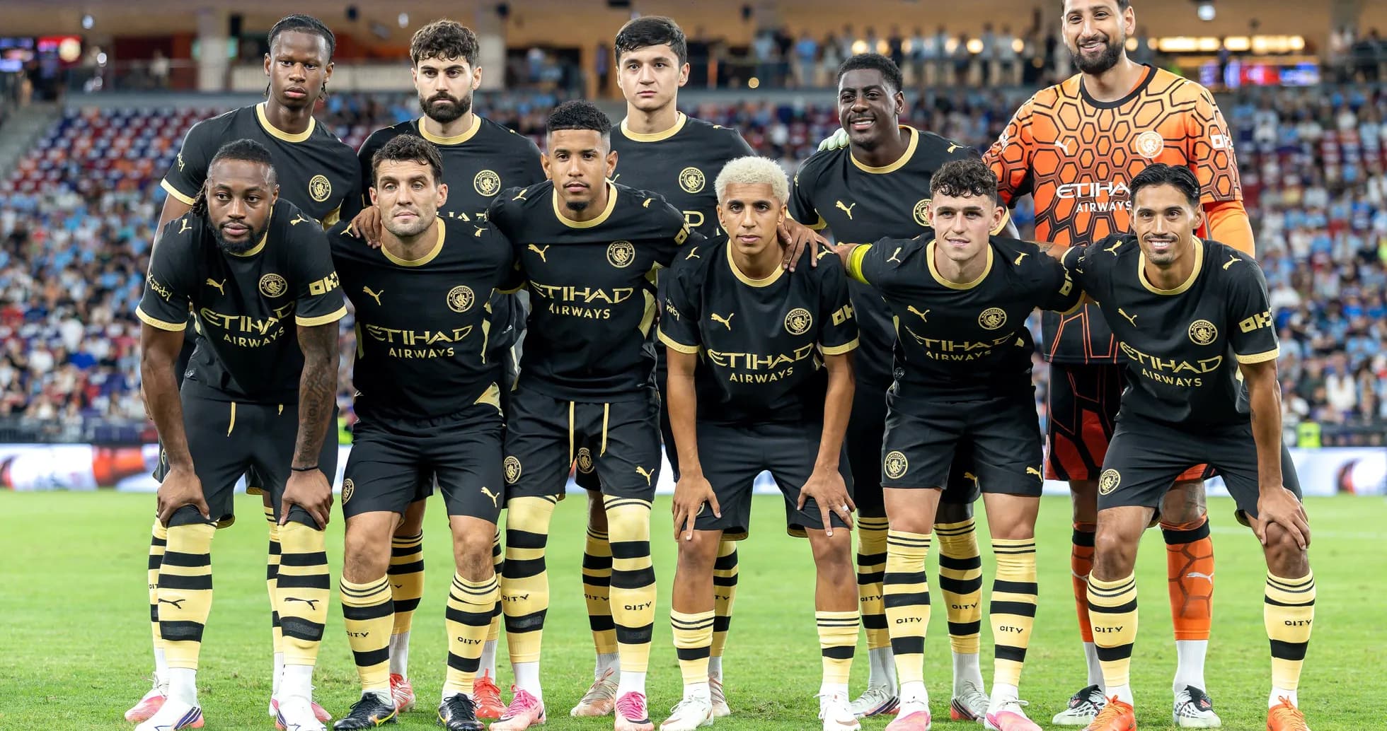 Football team posing for photo before match Football team posing for photo before match