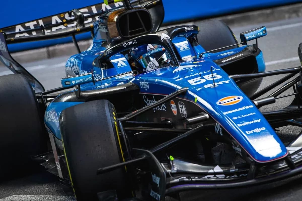 Formula 1 car racing on track during event Formula 1 car racing on track during event