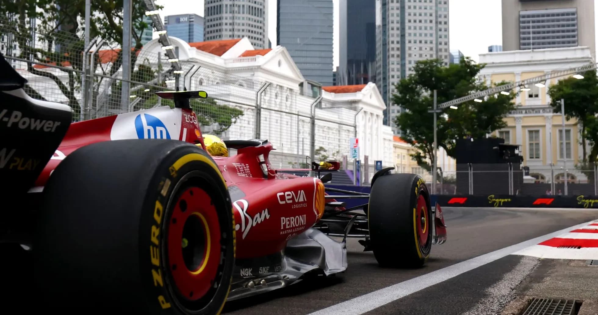 Formula 1 car racing on urban circuit in Singapore Formula 1 car racing on urban circuit in Singapore