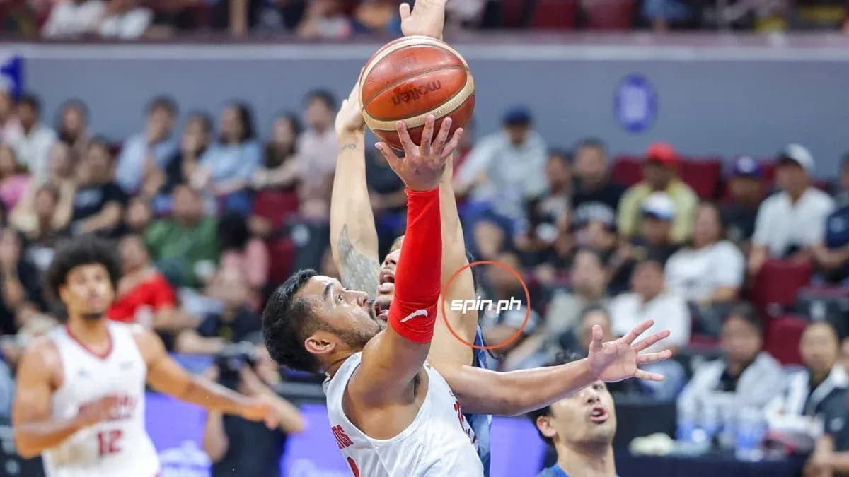 Player shooting the basketball during a game Player shooting the basketball during a game