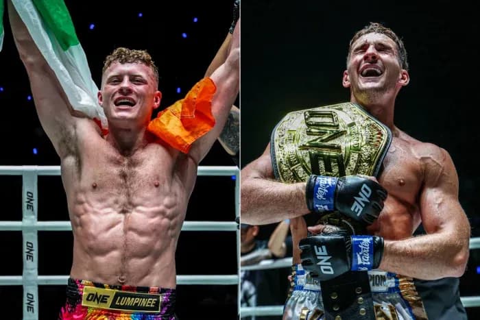Two victorious fighters celebrating in the ring Two victorious fighters celebrating in the ring