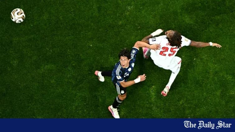 Player attempting to control the ball during match Player attempting to control the ball during match