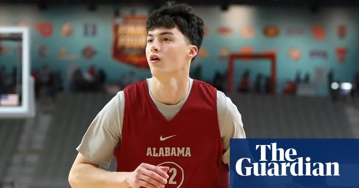 Basketball player in Alabama jersey during practice Basketball player in Alabama jersey during practice