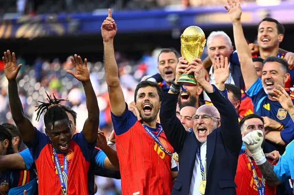 Spain team celebrating with FIFA World Cup trophy Spain team celebrating with FIFA World Cup trophy
