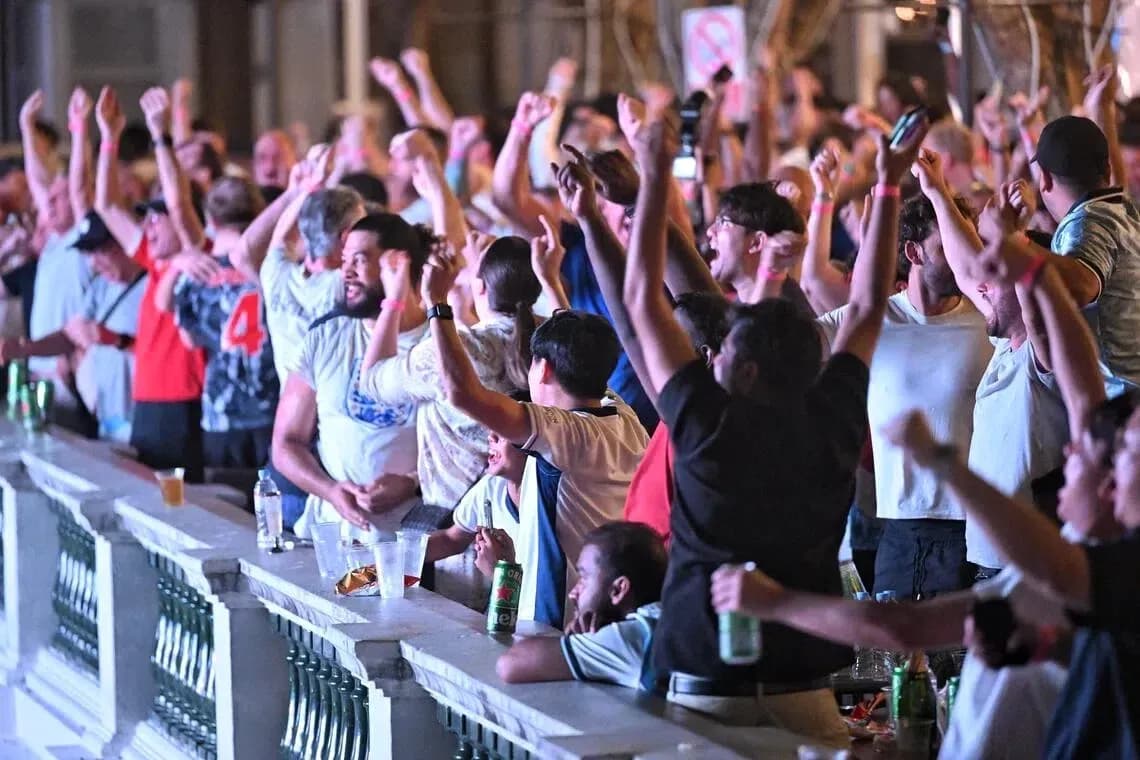 Fan crowd celebrating during a sports event Fan crowd celebrating during a sports event