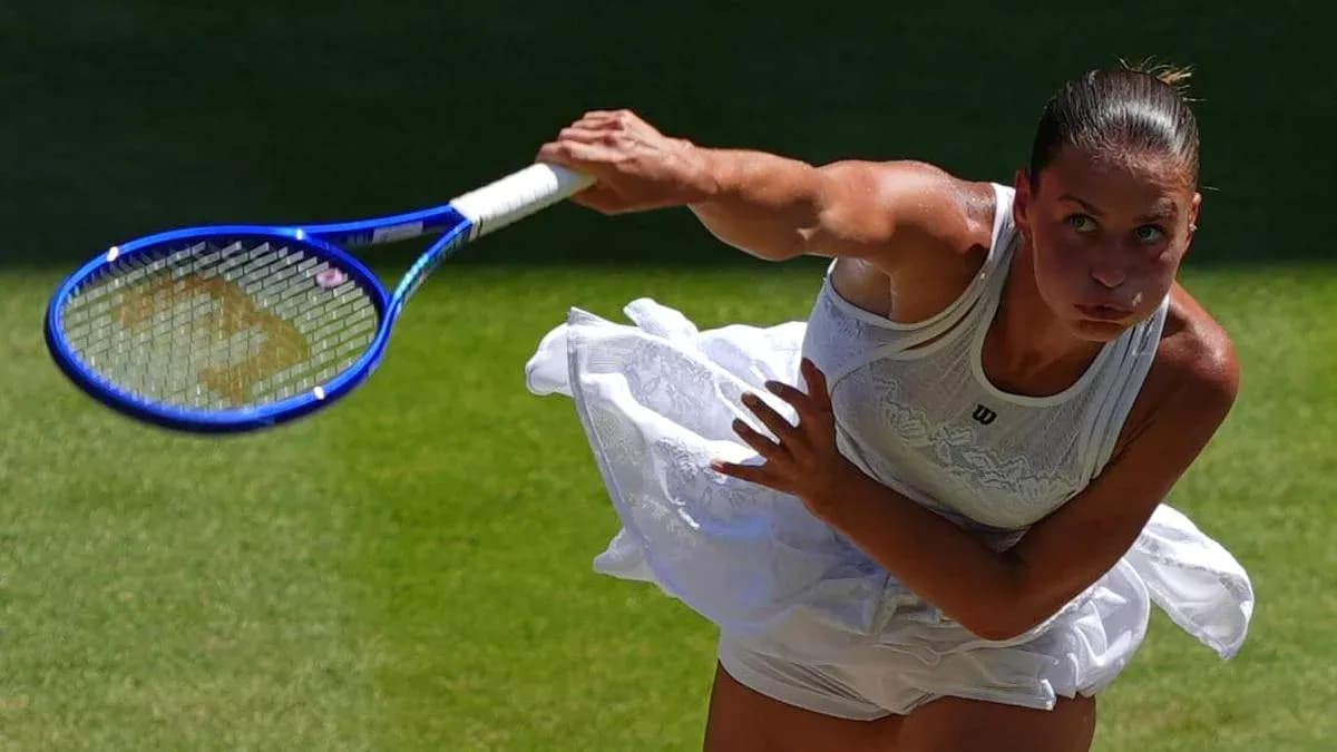 Tennis player serving on grass court Tennis player serving on grass court