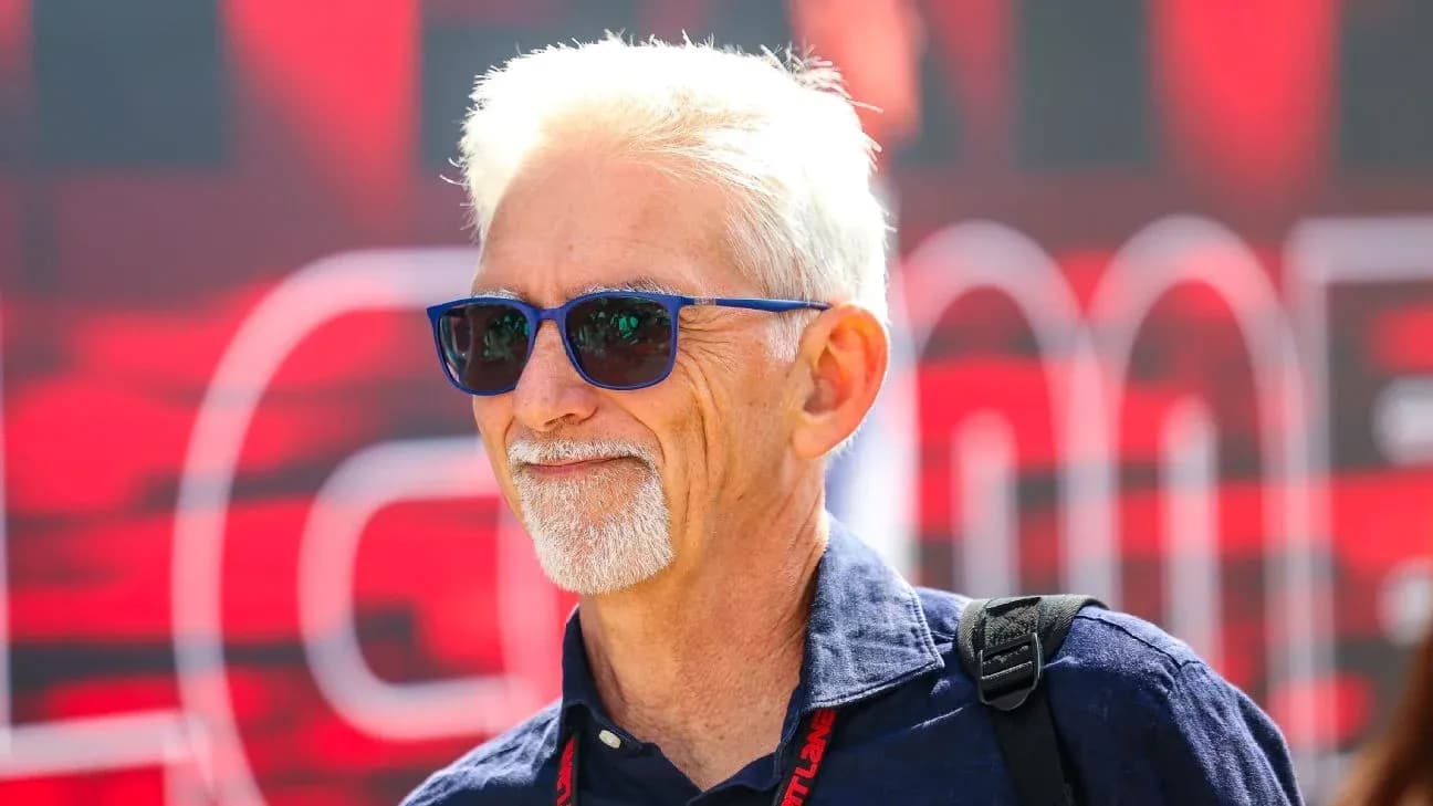 Man wearing sunglasses at a motorsport event Man wearing sunglasses at a motorsport event