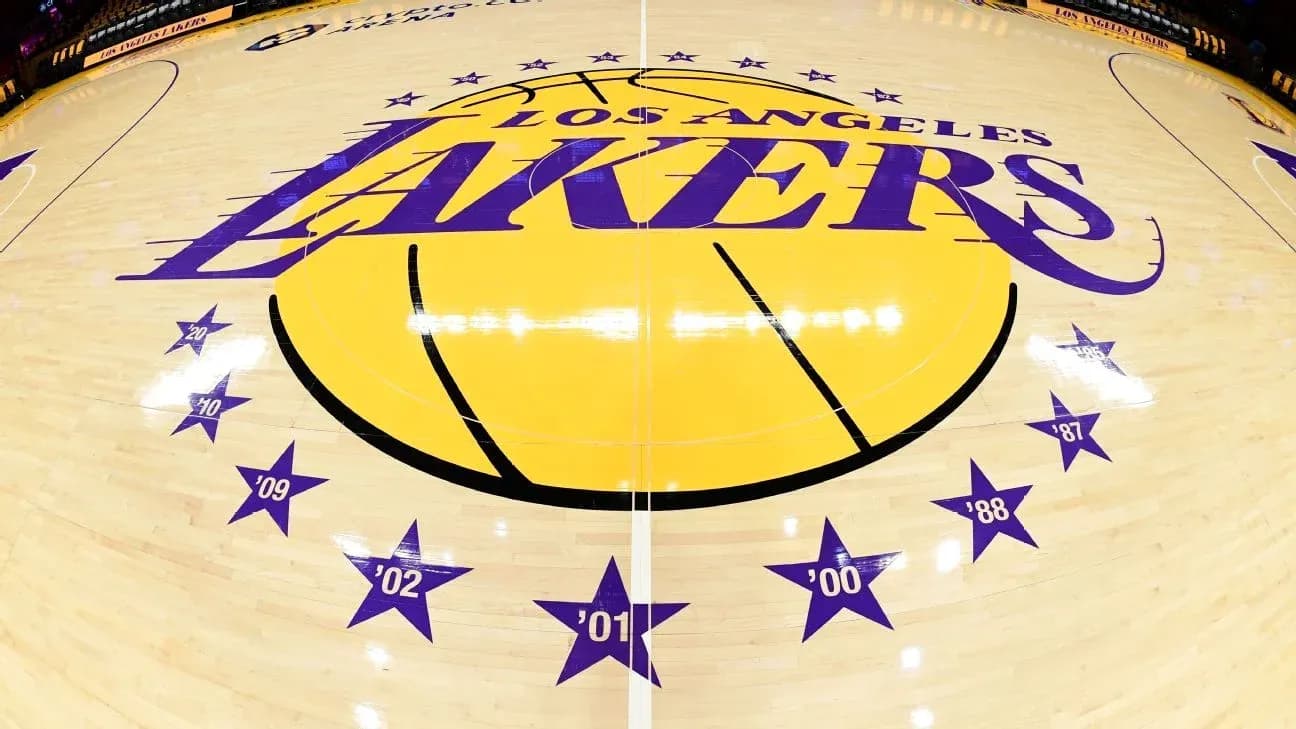 Los Angeles Lakers logo on basketball court floor Los Angeles Lakers logo on basketball court floor