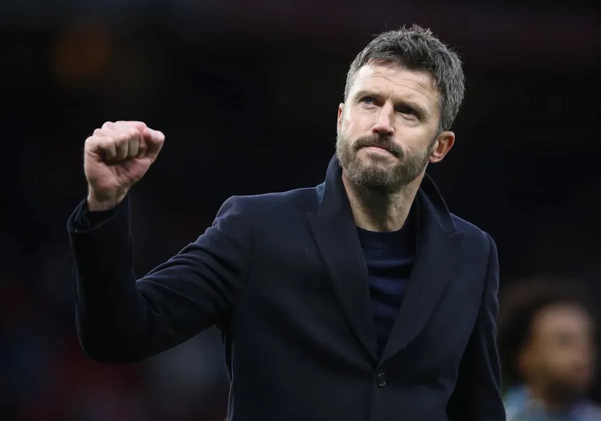 Coach celebrating with a raised fist after match Coach celebrating with a raised fist after match
