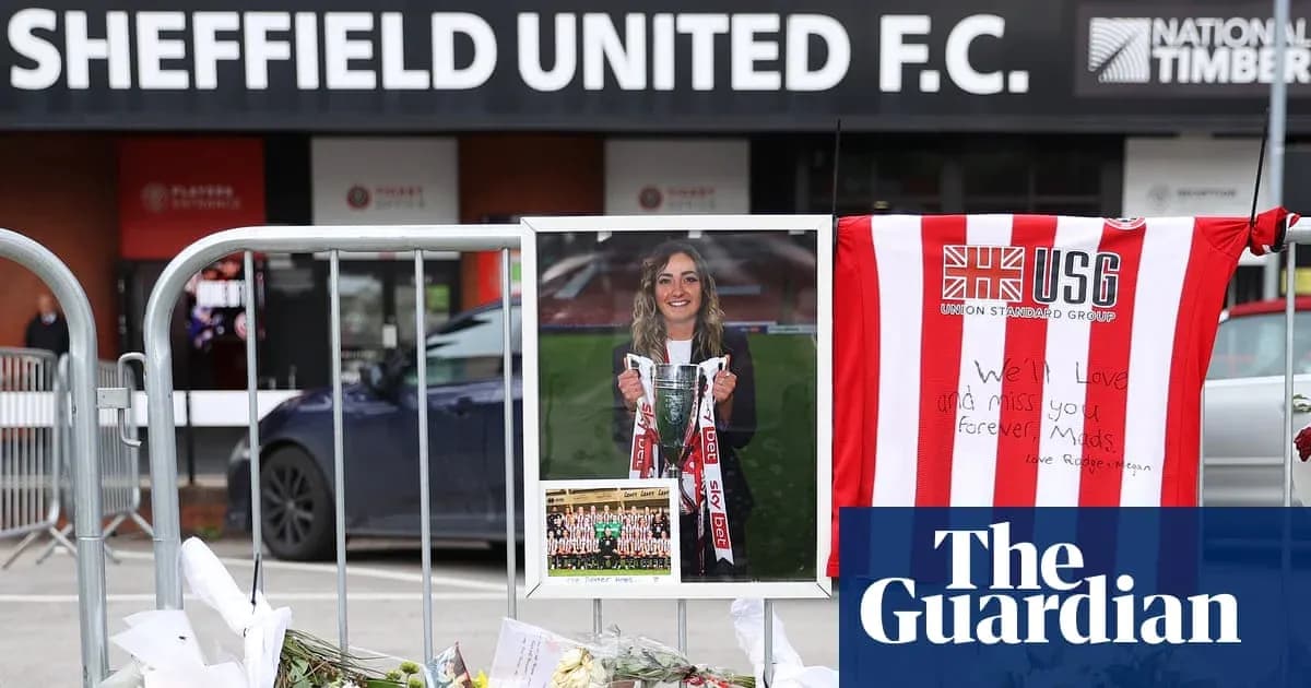 Memorial with flowers and tribute outside stadium Memorial with flowers and tribute outside stadium