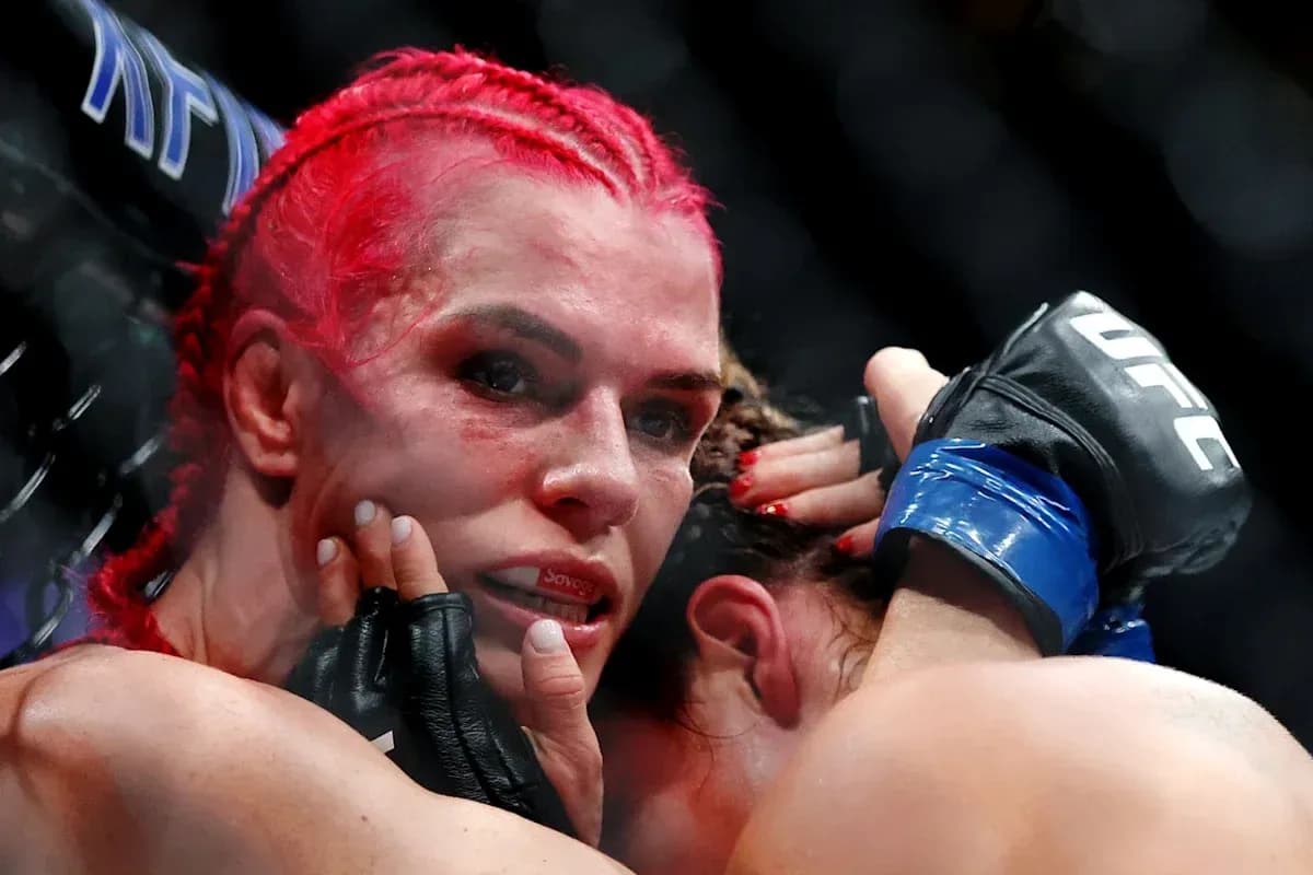 MMA fighters grappling in the octagon during match MMA fighters grappling in the octagon during match