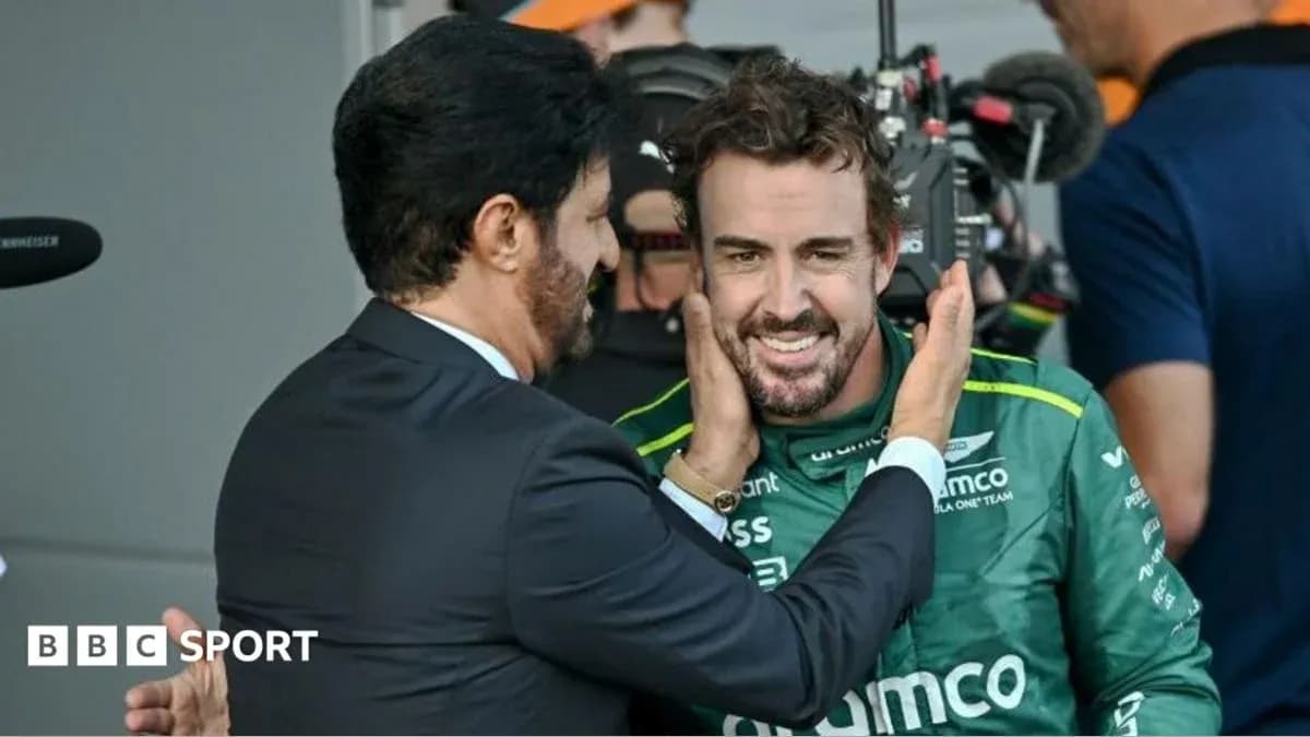 Two men celebrating after a race in the paddock Two men celebrating after a race in the paddock