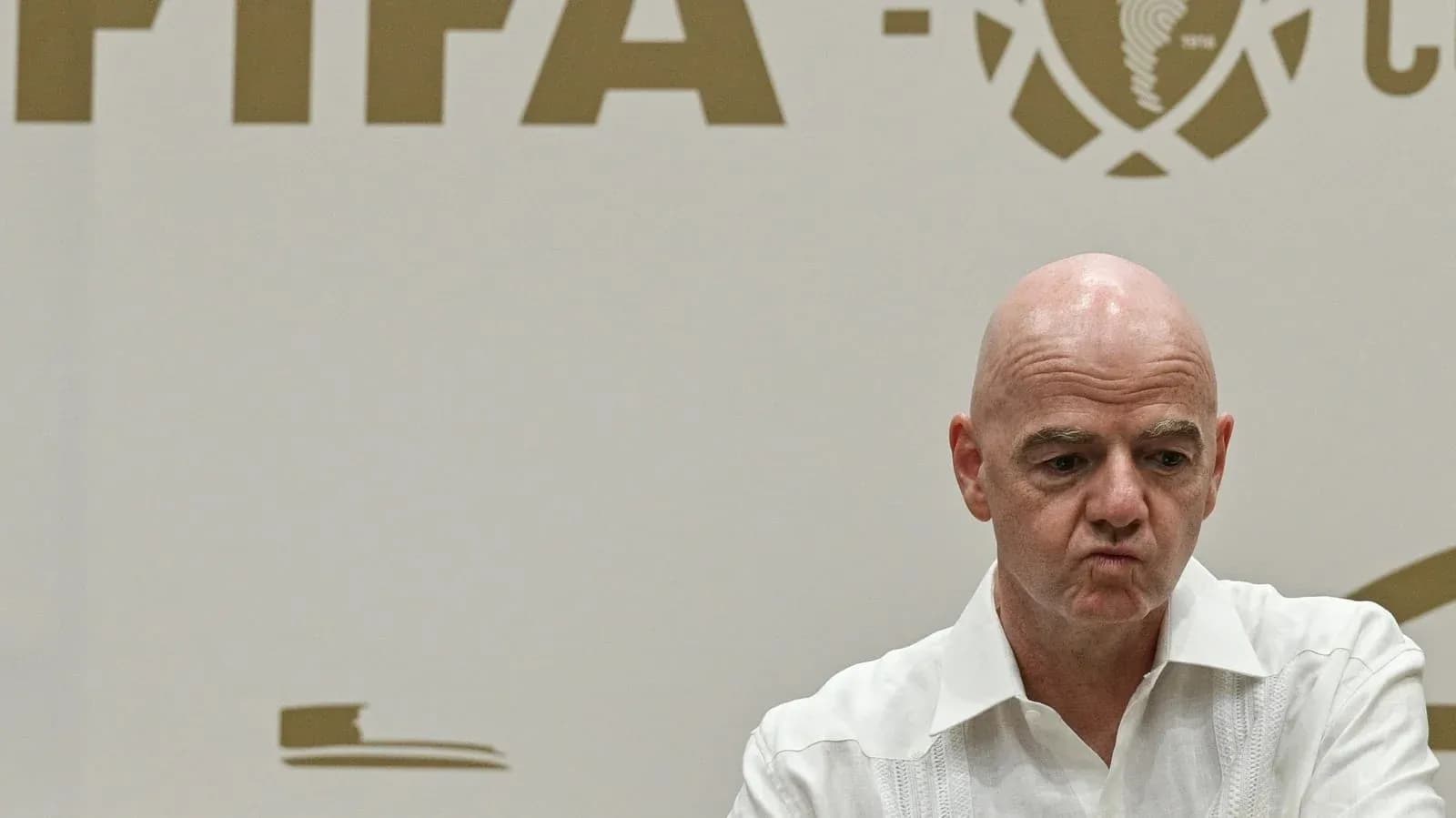 FIFA official speaking at a press conference FIFA official speaking at a press conference