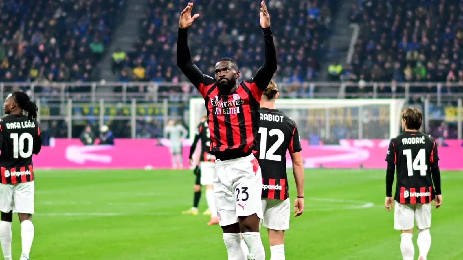 AC Milan players celebrating during match at stadium AC Milan players celebrating during match at stadium