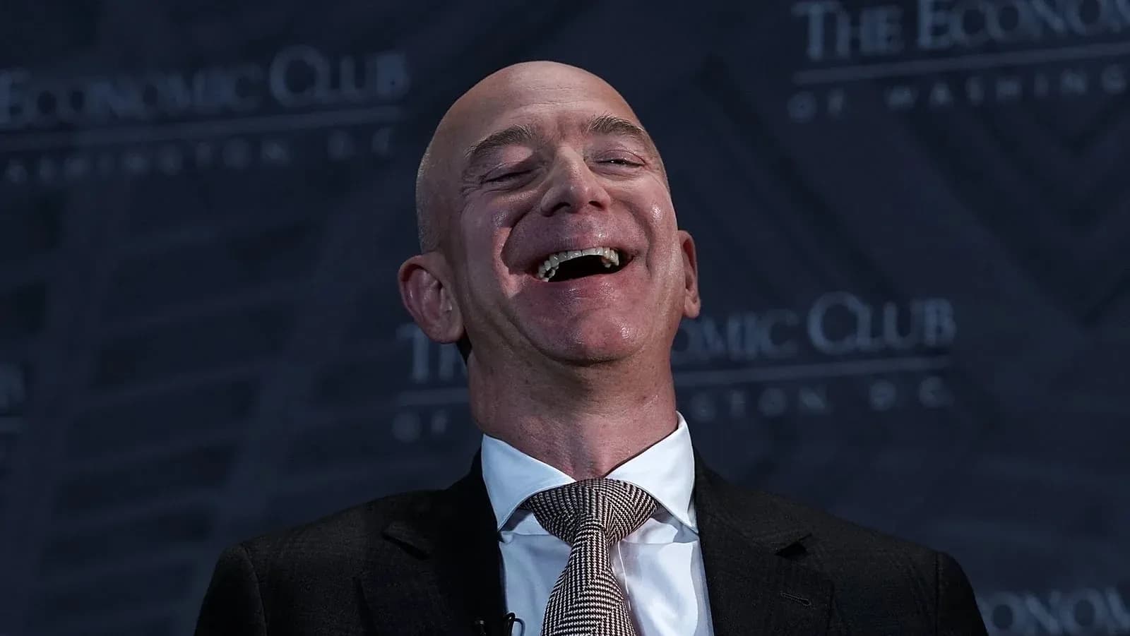 Speaker laughing at Economic Club event Speaker laughing at Economic Club event