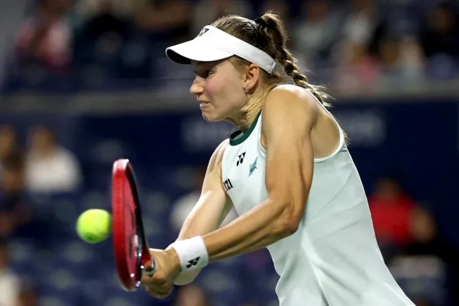 Tennis player hitting the ball during match Tennis player hitting the ball during match