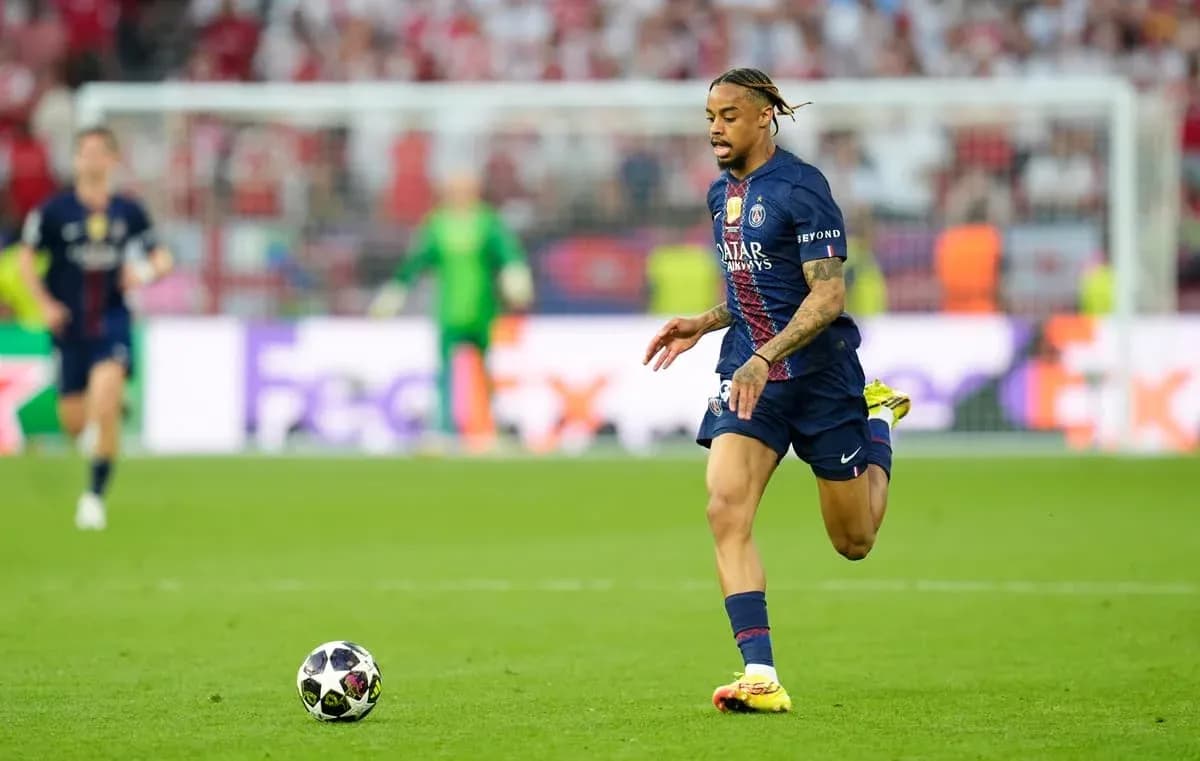 PSG player running with the ball during match PSG player running with the ball during match