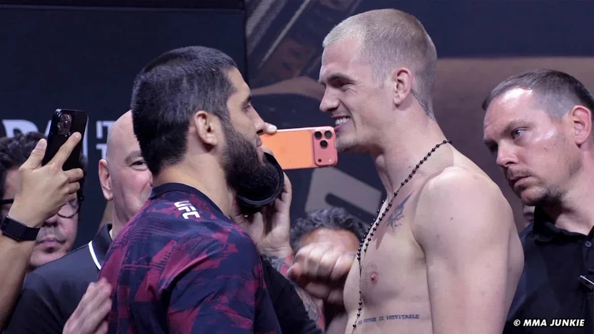 Two fighters facing off at weigh-in event Two fighters facing off at weigh-in event