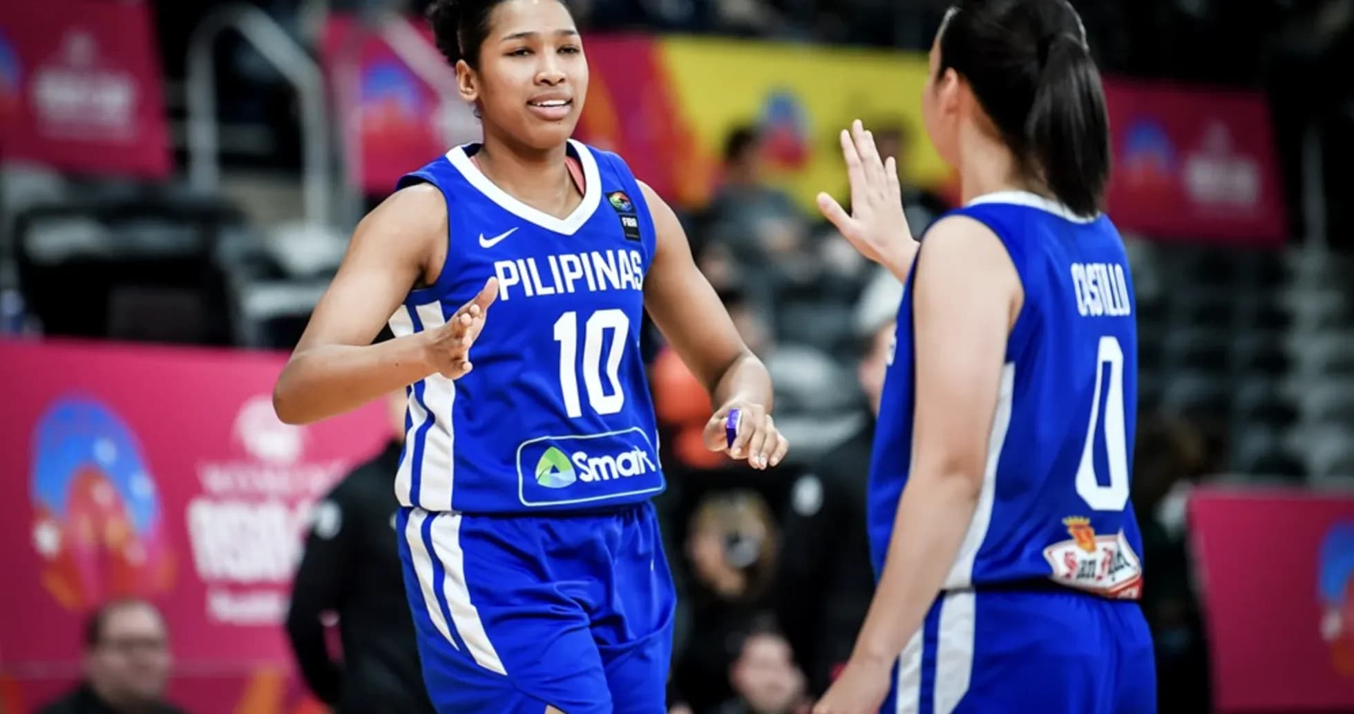 Duo of players celebrating during basketball match Duo of players celebrating during basketball match