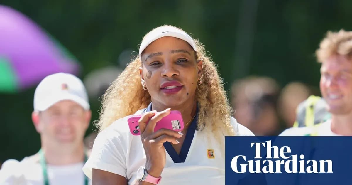 Tennis player holding phone during event Tennis player holding phone during event