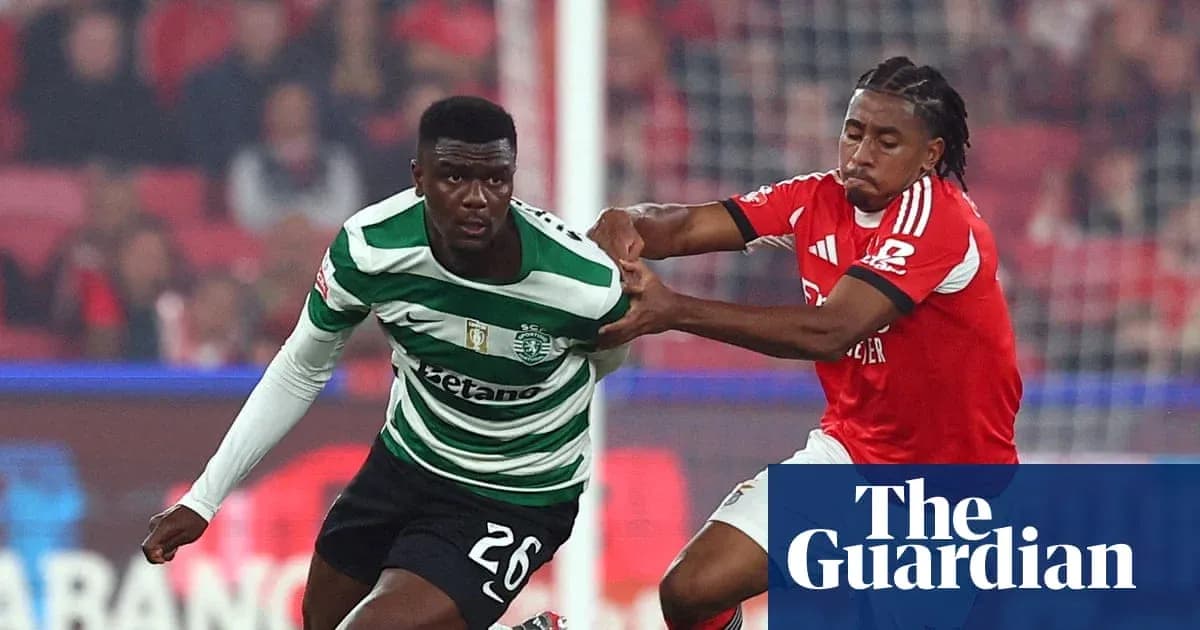 Sporting CP and Benfica players competing for the ball Sporting CP and Benfica players competing for the ball