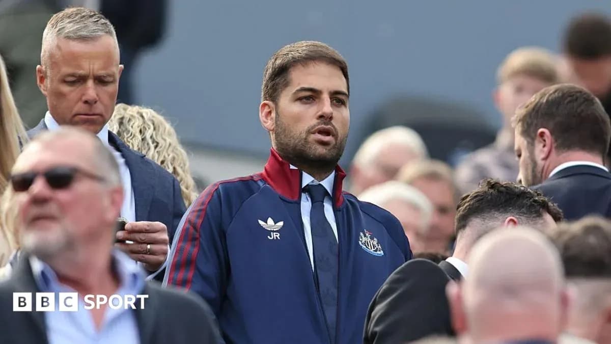 Man in Newcastle kit among crowd at event Man in Newcastle kit among crowd at event