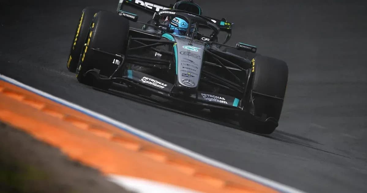 Mercedes F1 car racing on track during event Mercedes F1 car racing on track during event