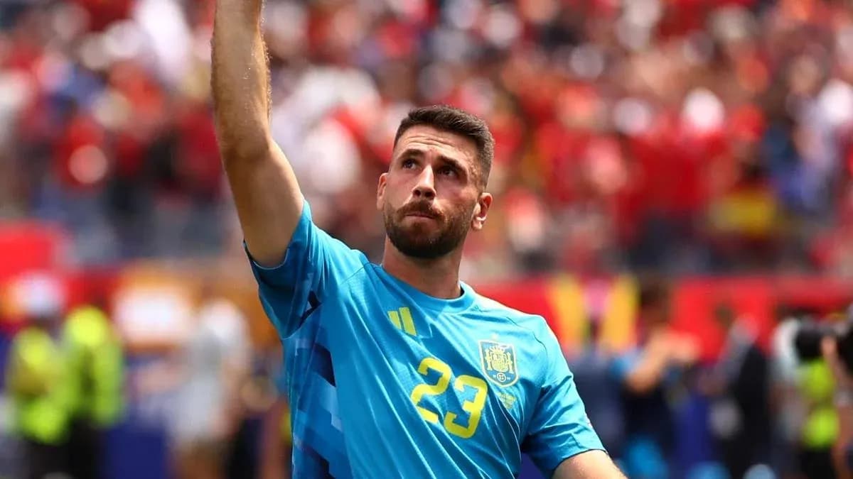 Goalkeeper celebrating with raised hand during match Goalkeeper celebrating with raised hand during match