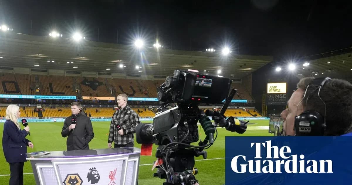 Television presenters discussing match at stadium Television presenters discussing match at stadium