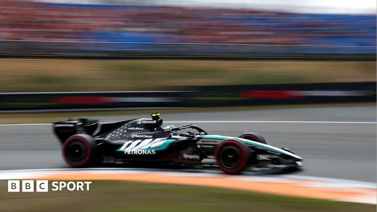 Formula 1 car racing on track during event Formula 1 car racing on track during event